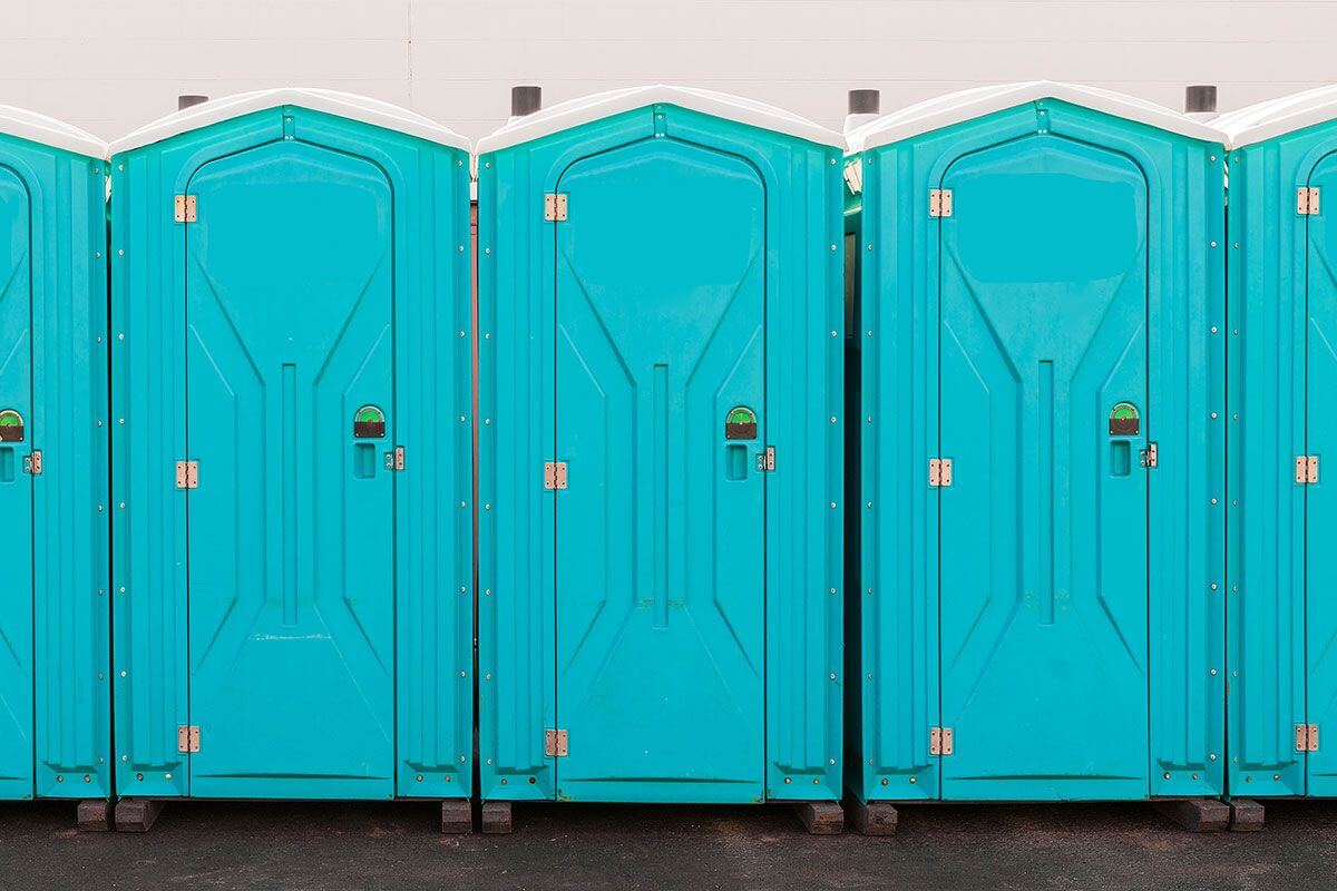Industrial portable restroom units at a plant in Vacaville, California